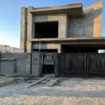 Modern double-story house under construction by the best construction company in DHA Lahore.