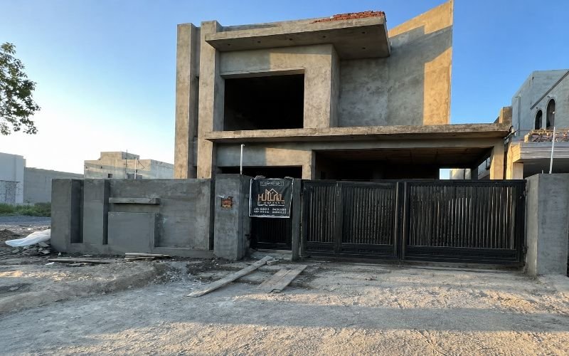 Modern double-story house under construction by the best construction company in DHA Lahore.