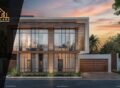 Modern front elevation design featuring expansive glass panels and stylish tiles, showcasing a contemporary architectural look with warm lighting and a landscaped exterior.