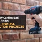 Person using a Bosch 18V Cordless Drill on a brick wall, showcasing its efficiency for USA construction projects.