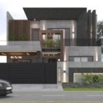 Modern luxury house exterior with sleek black and grey design, stylish lighting, and lush green landscaping. A black Audi is parked in front, enhancing the elegant look.