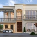 A beautifully designed modern house with elegant exterior details, featuring wrought iron balconies, large glass windows, and a spacious car porch. The perfect representation of high-quality house construction in Lahore.