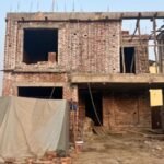 Under-construction house showcasing grey structure construction services in Lahore by Highland Properties & Constructions.