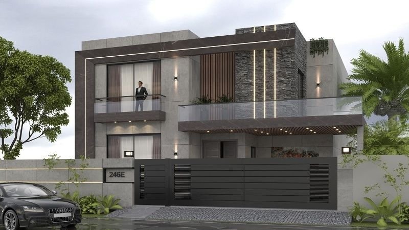 Top Modern House Styles Construction Services in Lahore – A luxurious modern house with sleek grey concrete finishes, glass railings, warm accent lighting, and elegant landscaping.

