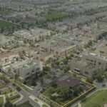 Aerial view of modern houses and green spaces in DHA Rahbar Phase 2, Lahore.