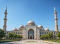 Elegant mosque with domes and minarets, showcasing expert mosque design and construction services.