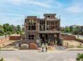 House Construction in Nespak Housing Society Lahore – modern double-storey house under construction.