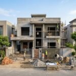Construction Cost for a modern house under construction with workers on site.
