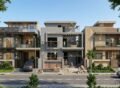 House Construction in DHA Rahbar Lahore with an under-construction modern residential house between completed luxury homes.