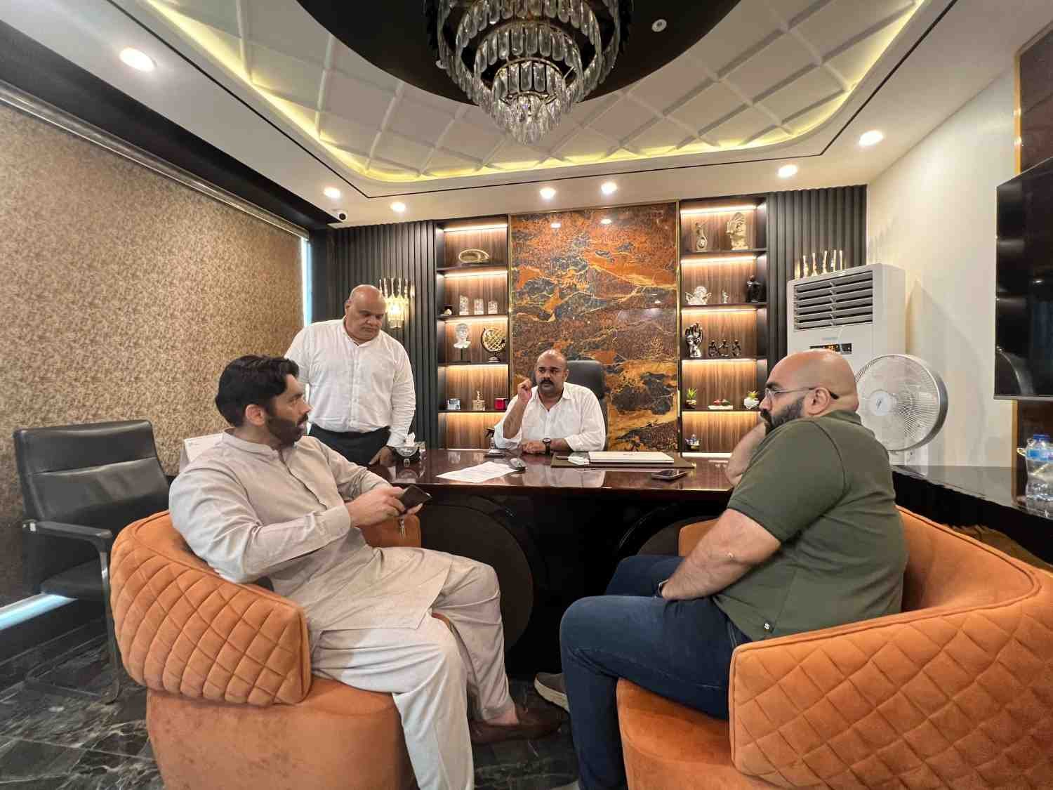 Project planning meeting for a construction project in Lahore