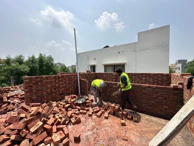 Wall brickwork at a construction project in Lahore