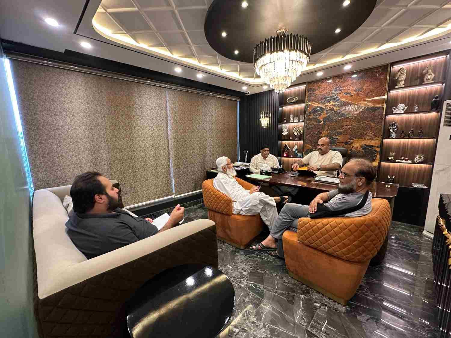 Client meeting for a commercial construction project in Lahore